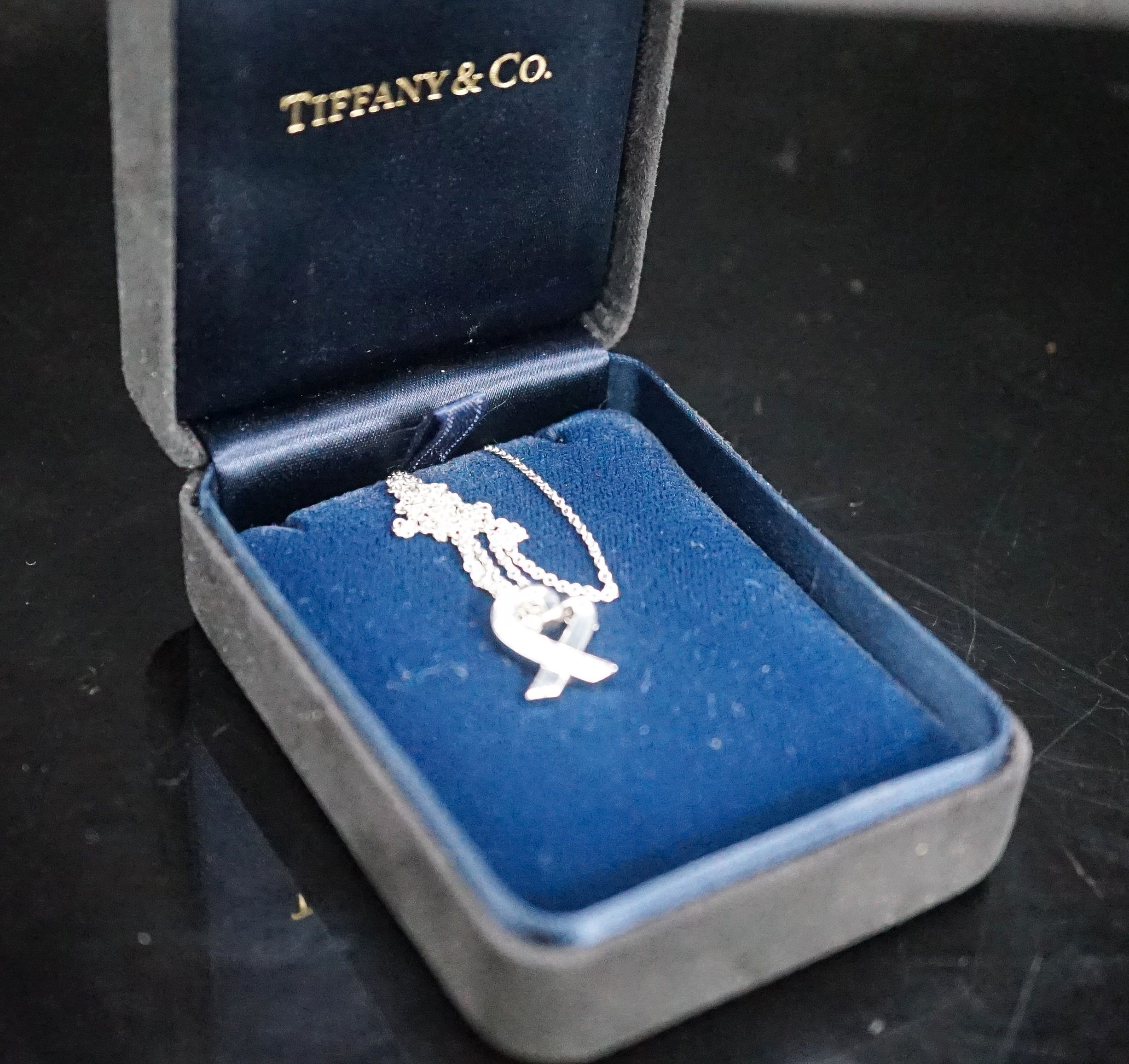 A modern Paloma Picasso for Tiffany & Co 750 white metal and diamond set loving heart pendant necklace, pendant 15mm, gross weight 2.9 grams, with Tiffany & Co box.